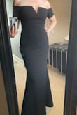 I love this dress, it gives instant old Hollywood vibes and creates curves out of nowhere without boning! Fabric is stretchy and substantial enough to hide imperfections without feeling too heavy. The sleeves do restrict movement a little, but not as much as other off-the-shoulder styles I've tried. Length is perfect for me with 3" heels. - Erin W.