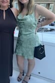 I am typically a size medium, but chose to go with the large in hopes that it would be a little longer. It ended up still being a little shorter than I would have preferred, but still fit nicely since I am on the shorter side. Wore it to a wedding and got lots of compliments! - Emma G.