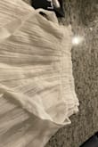 I was really looking forward to the blouse that I ordered. Was planning to wear it on an upcoming trip to NYC. The package arrived the day before I left town and imagine my surprise when I opened the bag and saw a pair of ivory skorts. Extremely disappointed. Not even in the same category as a blouse. Had to return. Not sure if I would order from this company again. - Lucy A.