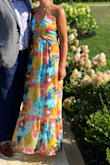 This dress was perfect for a summer wedding! It was light and airy. The overall fit was true to size. Where the zipper zips in the back was a little loose but overall great fit. - Andrea F.