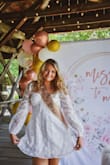 I wore this dress for my bridal shower! I got so many compliments and it met all my expectations! The sleeves are gorgeous. It does run a little short in length but I'm 5'8 and it didn't bother me! If you're thinking about it, buy it - Shannon S.