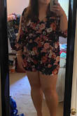 I was pleasantly surprised that this romper fit as well as it did since it's hard to find one that is flattering. It was a little hard to wiggle into because of the sleeves but cute and comfy once it was on. The only two small issues I had with it were the length and the v-neck button closure. The length was a little short so I was worried about it riding up as I walked around, but it mostly stayed in place. Might be too short if you're taller though. As for the v-neck, I did not find it too low cut but the button that holds the v-neck together was not as secure as I would have liked it to be; it snaps open easily when you stretch it too far. But overall it was cute and I did wear it to a bridal shower where I received several compliments on it.

 TLDR; if you're tall or have big boobs, it might feel too short or low cut depending on your preference, but otherwise it fits fine and looks nice. - Molly T.