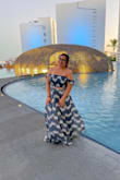 The dress itself is beautiful and the material is good. Only issues I had was it running a little small on me. Also, with my height being 5'2, The dress was very long as I did not have the time to alter the dress. I did trip a few times over it = - Cheryl A.