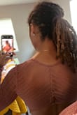 I love the style and design of this shirt, but I just don't think the material works for me. I've put it on once and by the time I removed it, there was a hole along the back seam. - Liana G.