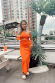This dress was exactly what I was looking for, a sexy yet sophisticated look. It fit me perfectly and I was able to wear it without a bra. It wrapped around my body perfectly. The only tricky part was putting it on but I managed. The color was vibrant for summer. The length was perfect and the material felt comfortable. It is slightly see-through so just be mindful when choosing the color. - Maria F.