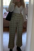 These are one of the only pairs of pants I have that come in enough at the waist, while being large enough at the hips. No belt needed! Very flattering for a more hourglass figure. 
The fabric is high quality and these are perfect for work. - Melissa S.