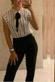 Wore this when I had to do a presentation! Got a ton of compliments! Had to wash around the collar because I had tinted SPF on and it rubbed off, but it cleaned easily! Fit PERFECT! - Corina M.