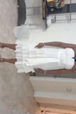 The material was not I thought it would be, but nonetheless love it. It made me feel beautiful.. I wore it to a wedding and received many compliments... I bought a L. I have it in red and white - Gail P.