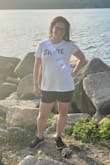 This was a fun shirt to wear during my bachelorette! It's cute, simple, and very soft. The color is a bit off-white, which you can tell from how white the sash is. The shirt was also a bit long, but I liked the length. I would definitely recommend it! - Heather S.