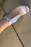 I love these. I double knot the ankle ties, then I tuck the top tie behind the knot so that both ties are pointing down, otherwise it can stick out a little crazily. They are adorable. - Gianna S.