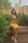 I wish the length was longer. Every dress I've ordered in this size has been long enough but this jumpsuit was definitely shorter. - Kathryn B.