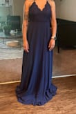 The dress is so comfortable! It's soft and not stiff, very easy to move in. It's pretty loose-fitting on me, which I like. - Simone P.