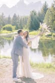 This dress was absolute perfection for my elopement. It fit me like a GLOVE. I am typically a size 14 in Jeans and wear a size Large top. The length was great for me too. I am smaller in the bust and curvier in the hips and it fit as expected. Once I hit the gym and toned up my glutes we were good to go. I wore it without a bra and I had no worries at all, plenty of padding/structure in the chest. The zipper was nice and durable too. I'm sad I don't have an excuse to wear it again. - Alexandra K.