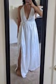 The quality of this dress does not match others in their bridal line. Very thin & flimsy, also the sizing was weird. I am between size 4-6, and ordered mediums for all the dresses I tried on from Lulus, but this one was larger than the rest. - Adriana C.