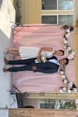 Beautiful dress. Used for my civil ceremony. I loved that it had a little fluff to it. Fit true to size. What I didn't notice was the pink underlayer, but still comes off as a white dress. - Emily D.