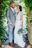 This dress fit like an absolute glove. The only alteration I made was to the hem along the front because I'm short but it ended up leaving me a beautiful little baby train. Couldn't have asked for a more perfect dress! - Chantel P.