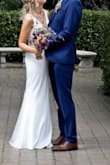 This is a lovely dress - made of nice material and not see-through. I wanted a simple dress without a train and couldn't find any in the bridal shops. This ended up saving me a lot of money as it was pretty perfect. I found the waist sat a little high on me so I got a seamstress to add in a 2" waistband with a belt - overall alterations weren't too expensive and I think it worked out perfectly. - Ruth R.