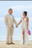 This is such a gorgeous dress! I wore this on my elopement wedding in Jamaica. So perfect and comfortable. I have to do some alterations to the dress. Also, I don't recommend wearing this to a church wedding but it's perfect for a beach location. - Lea D.