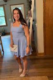The dress fit very well. I am more athletic build with a size A bra; it may be a bit too tight for anyone with a bigger bust. The material was smooth and very comfortable. The color was great. Loved how the skirt fluttered. - Bridget K.