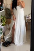 I was scared it wasn't going to fit but it actually fit perfectly! First and only wedding dress I've tried on and I'm saying yes lol! It's really great quality for the price! - Tabitha C.