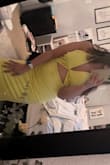 The color is vibrant and bottom fits tight but but top just fits way too loose on the sides. I had to kind pin extra fabric for it to fit. I really wanted to love it =+ - Camille C.