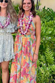 I bought this dress for a luau in Hawaii and was so obsessed with it! I will warn that the top portion is very thin/not lined, and see-through. I wore those stickie "skin colored" silicon-like stick-on bras and that was perfect. - Jennifer B.