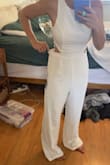 I am very true to size a small at Lulus & this jumpsuit was massive. At least a couple inches too big in the waist &.and the crotch was comical. Hung like 4 inches too long in the crotch hahah I don't have a short torso! I am very sad it didn't fit but honestly I can't imagine the XS would be much better with that crotch length. The style is so cute and it feels very comfy!! - Hayley S.