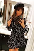 Love the dress it fits great there are no complaints! Looks cute when worn with white booties or heels and can be worn with sandals too. - Alexis S.