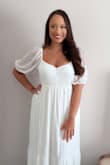 Wore this to my bridal shower and i loved it! The top part of it does run a little big but overall it's a great dress! - Haley L.