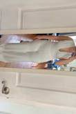 I bought this item because I saw it on someone else. I'm a 12 on top and a 14 on the bottom, so one-piece items don't always work. I ordered this in a large and exchanged for an x-large. The large fit my upper body and legs, the x-large fit my hips. However neither size worked well on me, so I've returned. I think this item is easier to wear in a color versus white. There is a nude lining, but I still needed seamless undergarments. Also, I found the seam at the waist to be awkward and bulky in both sizes. - Paige F.
