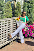 Love this top. Love the puffy sleeve and I'm a sucker for a crop top. The green color is just as pictured. Happy with my purchase. - Mary J.