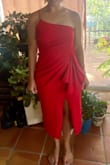 I LOVED this dress and received SO Many compliments. Fits beautifully. The cut makes you feel elegant while still standing out. The fabric felt great. There's a little give, but it doesn't stretch out. Made me feel fantastic. - Michael H.
