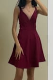 The material is quite a decent quality and the color was what was advertised online. The shape of the dress looks amazing. - Sisy L.