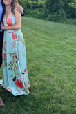Had to chop off a ton of length, but that's always the case for me being 5'. This dress is exactly as I pictured. It's so beautiful! The wrap dresses are always really nice for me being so petite I feel like you can really make them fit how you need them to. The fabric is so pretty. Had to stitch the front part together as when I sat, the top would pop open and you could see my mini ninies. Maybe if you're blessed with a chest it wouldn't be like that, but the top was uncomfortable I was closing it up and pulling at it to stay shut before I stitched the top together. Delicate fabric. So pretty. - Michelle