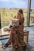 This dress is so pretty and sweet. The material does feel a little on the cheaper side to me but the stitching and fit are still top quality. - Sarah M.