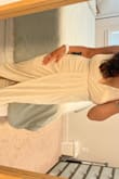 It has stretchy fabric and was very comfortable. Originally ordered a medium but didn't work well for my bust. Ordered a large which was much better! The shoulder straps are adjustable so I was able to make it fit how I liked it. Really hugs the curves! Super cute but wasn't exactly what I was looking for. - Alda S.