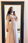 I like this dress and I will use as a bridesmaid for my sister's wedding, but it's not what I had imagined. The waistline is almost empire and a little big for me. The fabric is very light and airy, and yet there is so much of it that it feels bulky. It is also a much paler pink than in the advertised photo. I do like the neckline and back line though. Very elegant! - Joy M.