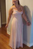Made me look fabulous on my special day.
I am only 5.1 and i got it tailored at my height 
I am usually a medium but on this one I ordered the small since i am thinner on my waist - Kiriaki B.