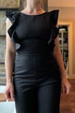 The inseam is long, and I was unable to fit into it in a way that maintained a cute look. Tried ordering both an S and an M. Lovely for someone with a longer torso! Unfortunately, I'll have to return. - Kathryn T.