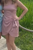 This dress was true to size & extremely soft and comfortable on the skin. The bow came untied quite often, but that's an easy fix. A lot of people commented on how much they liked the dress as well! - Shanna K.