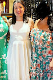 I bought this dress for my bridal shower and could not be happier. Based on reviews I bought the XL so that it wouldn't be too snug and it really was just right, if a bit loose. Needs a strapless bra which was no problem for me. Only comment I have is that it does wrinkle easily. - Virginia C.