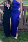 I absolutely loved this dress. It creates a sleek and sexy silhouette. It was a little long, but with heels it barely skimmed the floor. I plan to wear this again! - Leann G.