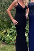 Wore it to a black tie wedding.  Lots of compliments.  Snug fitting & body forming. Perfect for the event and to wear again and again. Timeless gown. Heavy weight fabric.  Great quality. - Lori P.