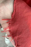 I bought this dress to wear for a wedding. Initially, I really liked it! It tends to "loosen" where the tie is, so have someone around that will tighten it for you! However, I found the dress and quality to be disappointing overall. I wore it for about 9 hours total, brought it home, washed it according to the instructions, laid it flat to dry, and then noticed the hemline was completely unraveled. Nothing out of the ordinary happened while wearing it to cause this. I also noticed the "pills" and unraveling of the material throughout the dress. Definitely don't recommend it. (For color purposes: the color is more accurate in the unraveled hemline picture, lighting was weird for both snapshots) - Andrea W.