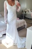 Sizing was tricky for me on this one. The shoulder button would not close but the sleeves ran large. Every other part fit like a glove. Quality of the dress was top-notch. - Briar H.