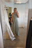 I am absolutely in love with this bridesmaid dress!! I bought an XL and it's a little big around the bust and a little long, so I'm getting it tailored (probably could have gotten a Large). Have to say that the neckline is not the most comfortable but it looks really good so I can live with that for 10 hours :P Super flowy dress, love the high slit! Great quality for the price, the dress is exactly as pictured and the sage colour is beautiful! I can't wait to wear this for my best friend's wedding in Italy!!! - Sophie W.