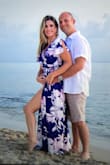 I like the dress. I normally wear a medium but this was a small and fit perfectly. Only complaint is I wish there was a small clip or button to keep it wrapped just below the hip. As it is if you let any leg show it likes to open up all the way to the waist. - Jenny M.