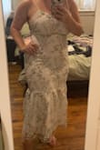 I ordered this dress for my wedding rehearsal and dinner since our venue is a greenhouse and it's perfect! It fits perfectly, and I love the adjustability because of the ties in the back. It's super comfortable as well, definitely recommend. - Christina T.