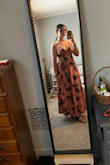 Love the silhouette! I'm about 5'9 1/2 and the dress comes right to my ankles without heels. I crisscrossed boob tape to help the girls out, although I don't think they would have fallen out or moved around much if I had gone without it. My only complaint is that the clasp broke, but luckily the ribbon covered it. I got so many compliments at the wedding; it was definitely a unique look! - Emily B.