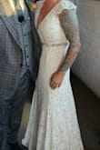If your not sure to purchase, all I can say is&. DO IT!!! When this dress came in, I was absolutely blow away by the quality of the dress. I made a couple changes to suit my vision such as adding a belt, opening the back and adding crinoline. Some alterations needed to be done at the hips for me, but otherwise the dress is true to size!
This dress is pure perfection! - Angel B.